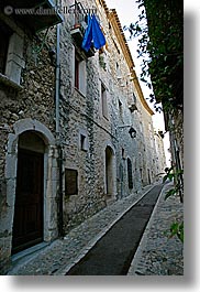 archways, blues, cobblestones, europe, france, materials, narrow, provence, st paul, stones, streets, structures, towels, vertical, photograph