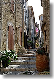 archways, europe, france, materials, narrow, plants, provence, st paul, stairs, stones, streets, structures, vertical, photograph