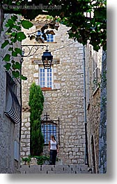 europe, france, ivy, materials, nature, people, plants, provence, st paul, stairs, stones, structures, vertical, womens, photograph