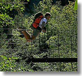 activities, backpack, bridge, clothes, colors, europe, forests, france, green, groups, hiking, men, nature, nicos, people, plants, provence, red, square format, structures, swing bridge, swings, trees, photograph