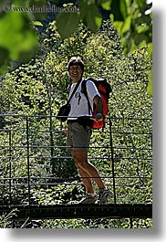 activities, backpack, bridge, clothes, colors, emotions, europe, forests, france, green, groups, happy, hiking, men, nature, nicos, people, plants, provence, red, structures, swing bridge, swings, trees, vertical, photograph