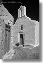 amorgos, bell towers, black and white, buildings, churches, doors, europe, greece, narrow, streets, structures, vertical, white, white wash, photograph