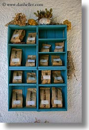 amorgos, bags, blues, browns, colors, europe, greece, shelves, spices, vertical, woods, photograph