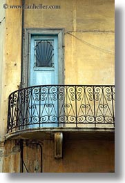 athens, balconies, blues, doors, europe, greece, stucco, vertical, walls, yellow, photograph