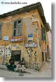 african, athens, buildings, europe, greece, people, ruined, singers, vertical, photograph