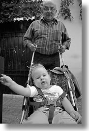 athens, babies, black and white, europe, grandfather, greece, people, stroller, vertical, photograph
