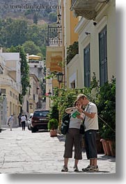 athens, europe, greece, looking, map, people, tourists, vertical, photograph