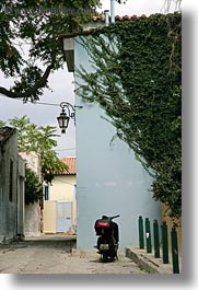 athens, buildings, covered, europe, greece, ivy, motorcycles, streets, vertical, photograph