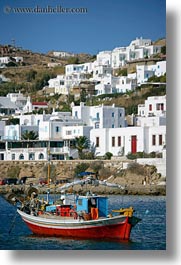 blues, boats, buildings, europe, greece, mykonos, red, structures, tops, vertical, photograph