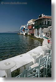 buildings, europe, greece, houses, mykonos, seaside, tables, vertical, waterfront, photograph