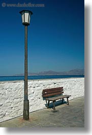 benches, chairs, europe, greece, lamp posts, mykonos, ocean, vertical, walls, white wash, photograph