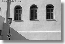 arches, black and white, europe, greece, horizontal, lamp posts, mykonos, threes, white wash, windows, photograph