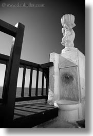balconies, black and white, europe, greece, mykonos, statues, vertical, photograph