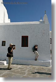 blues, cameras, colors, europe, greece, mykonos, people, photographers, two, vertical, white wash, photograph
