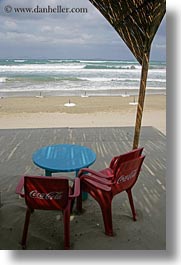 beaches, blues, chairs, coca cola, europe, greece, naxos, red, tables, vertical, photograph