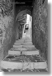 alleys, archways, black and white, europe, greece, narrow, naxos, stairs, vertical, white wash, photograph