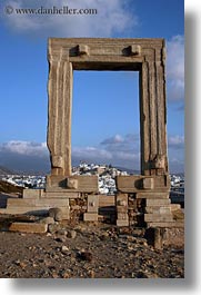 arches, architectural ruins, buildings, clouds, europe, greece, naxos, structures, temple of apollo, towns, vertical, photograph
