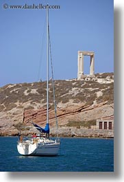 arches, architectural ruins, boats, buildings, europe, greece, naxos, structures, temple of apollo, vertical, photograph