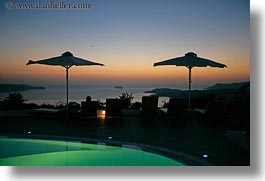 dusk, europe, greece, horizontal, hotels, pools, santorini, sunsets, swimming pool, umbrellas, photograph