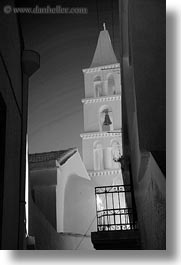 bell towers, black and white, buildings, churches, europe, greece, steeples, structures, tinos, vertical, white wash, photograph