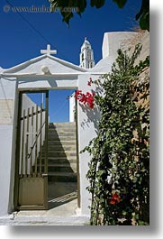 bell towers, bougainvilleas, buildings, churches, europe, gates, greece, red, structures, tinos, vertical, white wash, photograph
