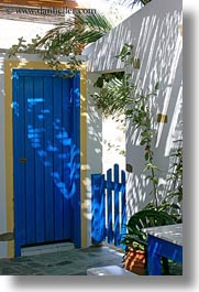 blues, doors, europe, greece, plants, shadowy, tinos, vertical, white wash, photograph