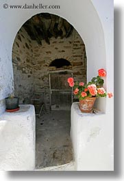 archways, europe, flowers, geraniums, greece, old, ruin, structures, tinos, vertical, white wash, photograph