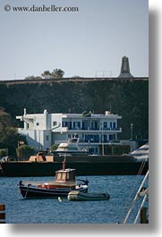 boats, buildings, europe, greece, harbor, monument, tinos, vertical, photograph