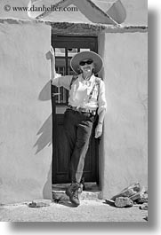 black and white, carol, clothes, doors, emotions, europe, greece, happy, hats, people, senior citizen, smiles, sunglasses, tourists, vertical, womens, photograph