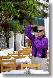 artists, blonds, cameras, carol, clothes, europe, greece, people, photographers, picture, sunglasses, taking, tourists, vertical, womens, photograph