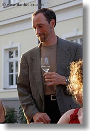emotions, europe, foods, glasses, groups, hungary, men, people, ron, ron seely, smiles, vertical, white wine, wine glass, wines, photograph