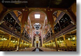 budapest, buildings, chandelier, europe, furniture, horizontal, hungary, interiors, jewish, lights, pews, religious, synagogue, temples, photograph