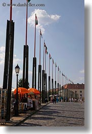 budapest, castle hill, europe, flags, hungary, poles, streets, vertical, photograph