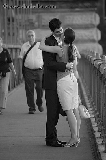 couple kissing images. couple-kissing-on-bridge-bw-2.