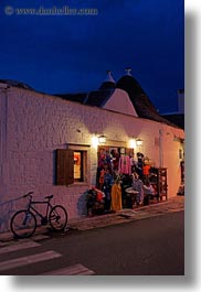 alberobello, buildings, europe, italy, nite, puglia, stores, structures, towns, trullis, vertical, photograph