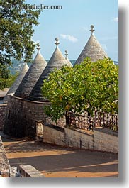 alberobello, among, buildings, europe, italy, puglia, structures, trees, trullis, vertical, photograph