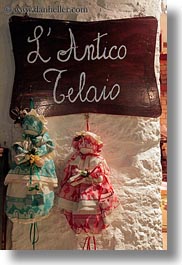 alberobello, dolls, europe, italy, puglia, vertical, walls, photograph