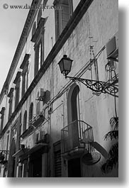 black and white, buildings, europe, gallipoli, italy, lamp posts, puglia, vertical, photograph