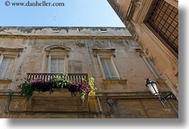 balconies, europe, flowers, horizontal, italy, lamp posts, lecce, puglia, upview, windows, photograph