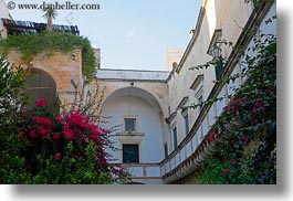 archways, balconies, bougainvilleas, europe, horizontal, italy, lecce, puglia, photograph