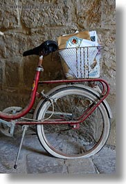 baskets, bicycles, europe, italy, lecce, mail, puglia, slow exposure, vertical, photograph