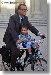 babies, bicycles, emotions, europe, humor, italy, lecce, men, people, puglia, vertical, photograph