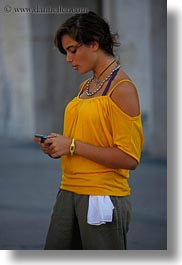 cells, europe, italy, lecce, people, phones, puglia, vertical, womens, yellow, photograph