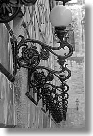 black and white, europe, italy, lamp posts, lecce, lights, puglia, rows, street lamps, vertical, photograph