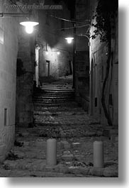 black and white, cobblestones, europe, glow, italy, lights, matera, narrow, nite, puglia, slow exposure, streets, towns, vertical, photograph