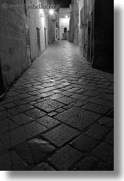 black and white, cobblestones, europe, glow, italy, lights, long exposure, matera, narrow, nite, puglia, streets, towns, vertical, photograph