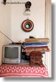 artifacts, books, europe, italy, masseria murgia albanese, noci, puglia, small, televisions, vertical, photograph