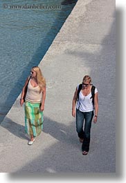 blonds, europe, italy, otranto, people, puglia, two, vertical, walking, womens, photograph