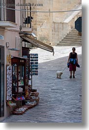 dogs, europe, italy, otranto, people, puglia, vertical, walking, womens, photograph