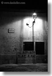 black and white, dusk, europe, italy, otranto, puglia, street lamps, vertical, photograph